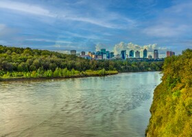 View Of Cityscape Against Cloudy Sky
