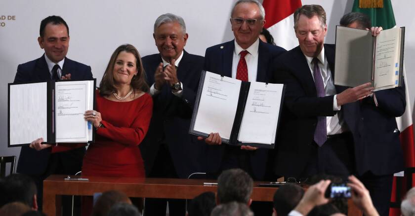 signature-du-nouvel-accord-de-libre-echange-americain-sipa.jpg